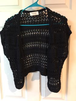 Woman’s black crochet shawl