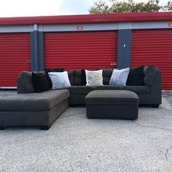 Gray L Sectional with storage Ottoman
