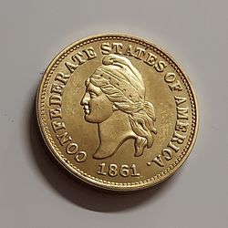(1861) CONFEDERATE STATES OF AMERICA
 1 CENT  COIN.
METAL: 22K. GOLD PLATED.
DIAMETER: 19X2.2MM.
WEIGHT: 4.6 GRAMS .
