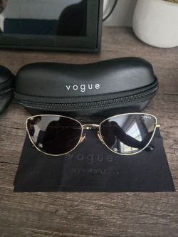 Brand new original  VOGUE sunglasses. Only removed from packaging to try them on but my daughter did not like them.