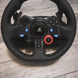 PlayStation steering wheel has never been used. If the post is still up you it’s available