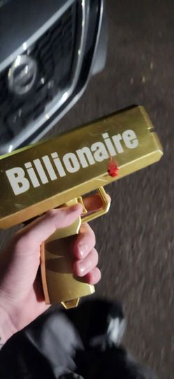 Golden Billionaire money gun