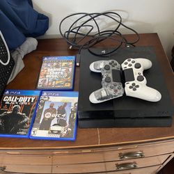 Ps4 With Controllers And Games 