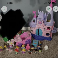 Little people, castle, and carriage
