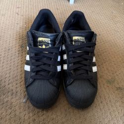 $50 Black and white Adidas Superstar trainers