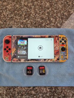 Nintendo Switch W/ One Piece Skin And 2 Games. No Dock. No Charger.