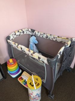 Playpen and folding shelves