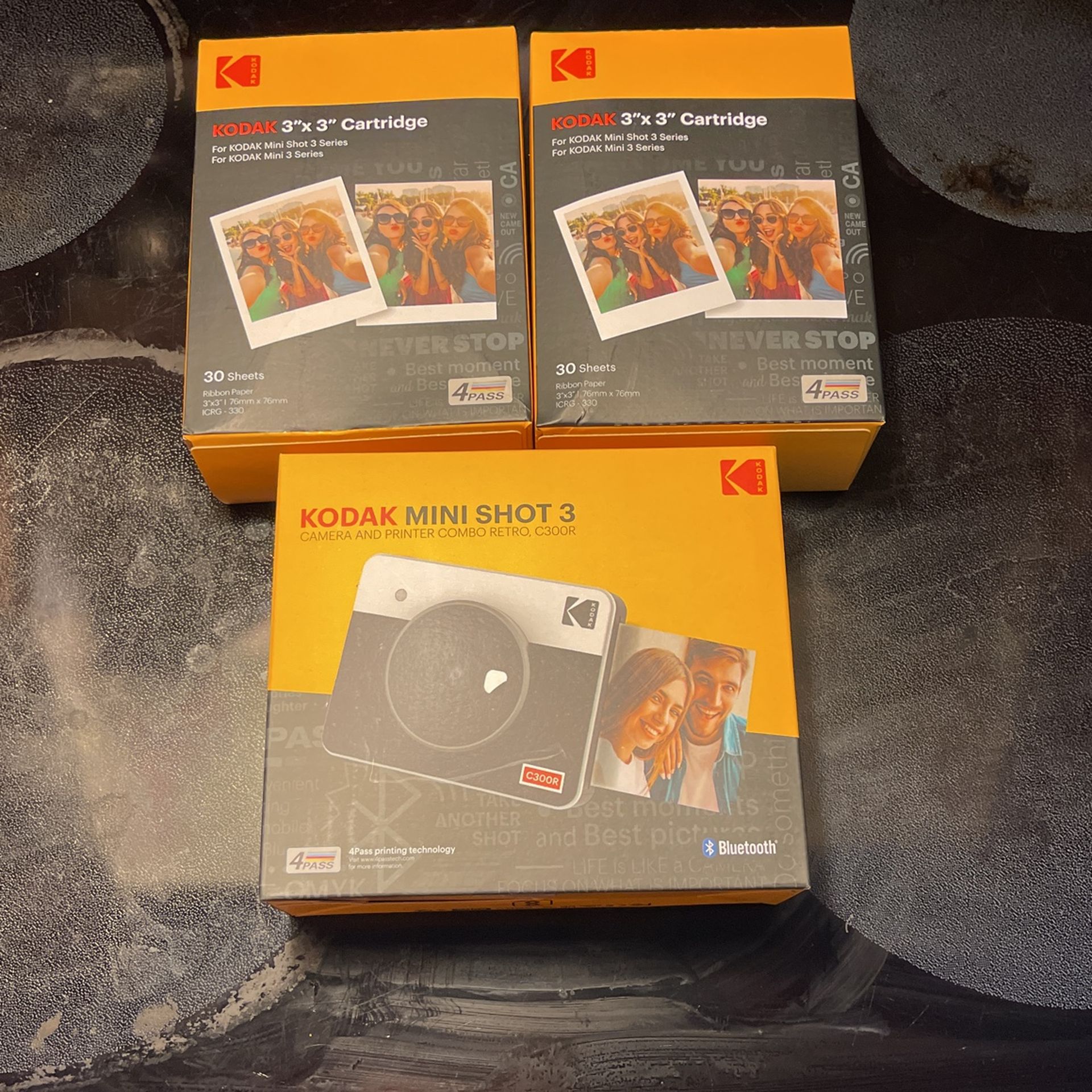New unopened KODAK Mini Shot 3 Retro 4PASS 2-in-1 Instant Digital Camera and Photo Printer (3x3 inches) + 60 Sheets Cartridge Bundle