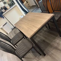 one Table and Four Chairs 