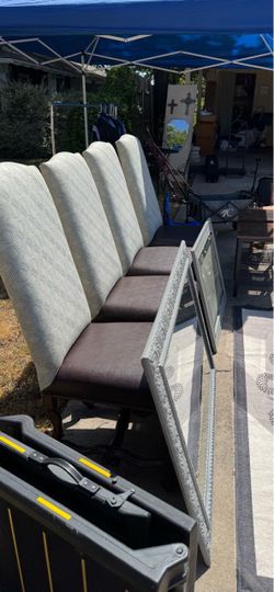 4 high back Dinning chairs in great condition leather seats cloth backs clean wood frames sturdy asking 160 for all 4