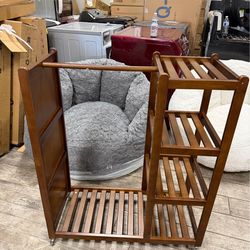Brand new walnut armoire for folding cloths has hanger and mirror