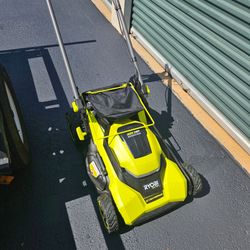 RYOBI 40V HP 21IN BRUSHLESS SELF PROPELLED  LAWNMOWER W/ 2 BATTERIES AND CHARGER