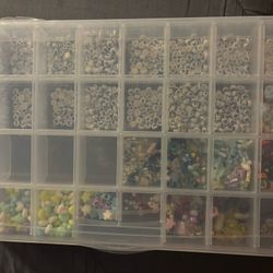 32 boxes with 15 letter beads and the rest random