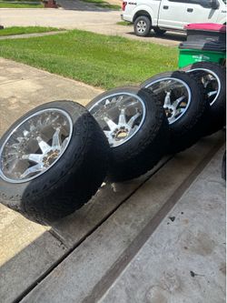 Rims & Tires .  22” X 14” Chrome Rims with Like New Tires
