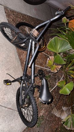Mongoose BMX bike  and a tire