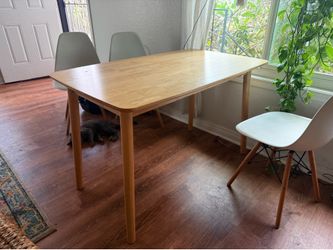 Light brown rectangular dinner table