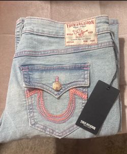 Light blue jeans, true religion with pink sketches Light blue jeans, true religion with pink sketches