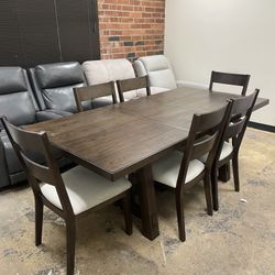 Six person dining room table and chairs