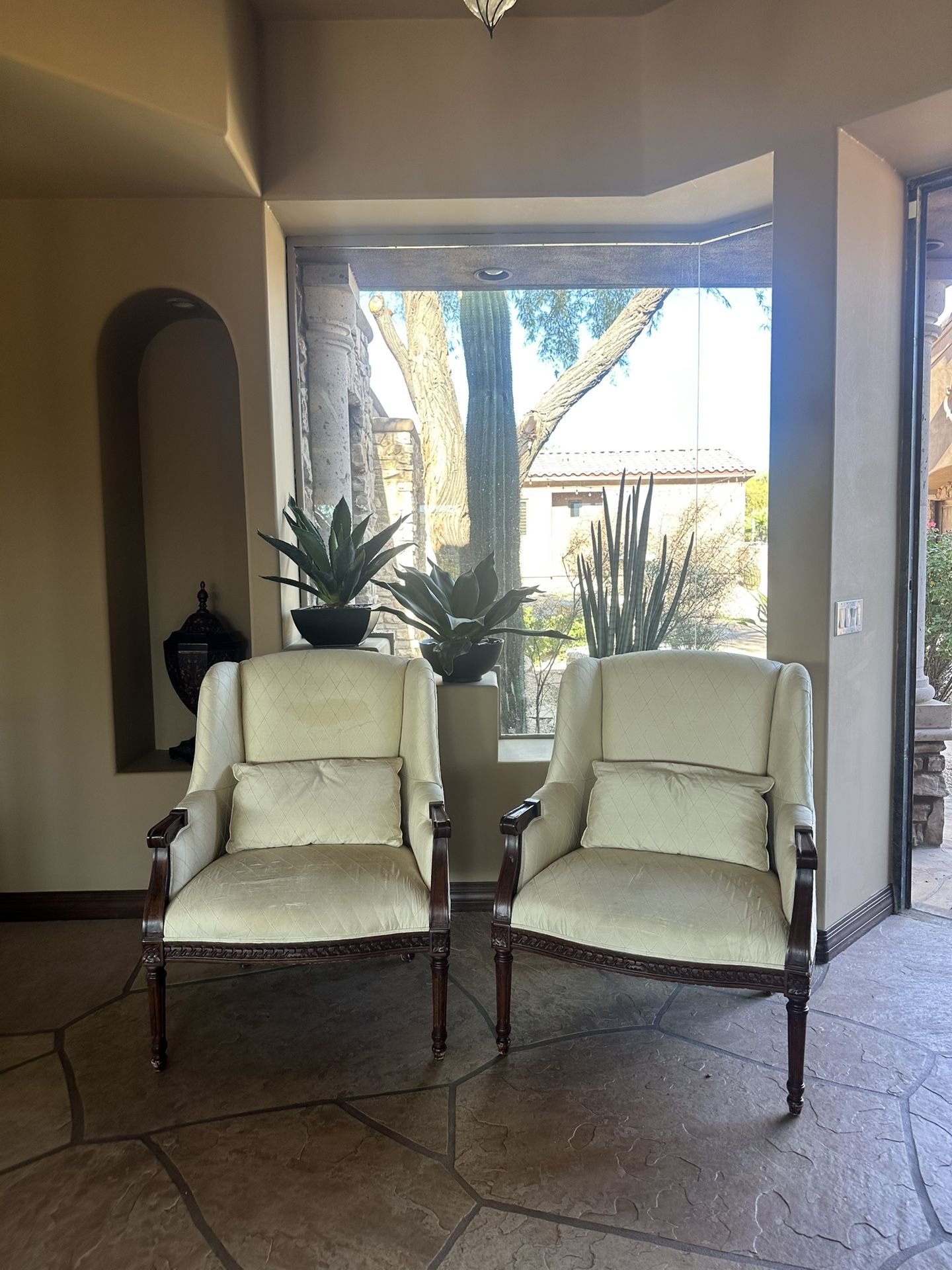 traditional high-back accent armchairs with a classic wingback silhouette and solid carved wood frames Chairs 