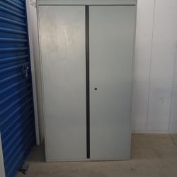 5ft 4 Inches By 3ft By 17 1/2 Solid Metal Storage Cabinet 