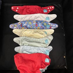 Charlie Banana Cloth Diapers – 7 Pack – Needs Elastic Repair  Lot of 7 Charlie Banana cloth diapers.  Well-known brand and great for someone who alrea