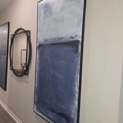 Two big blue picture frames paintings
