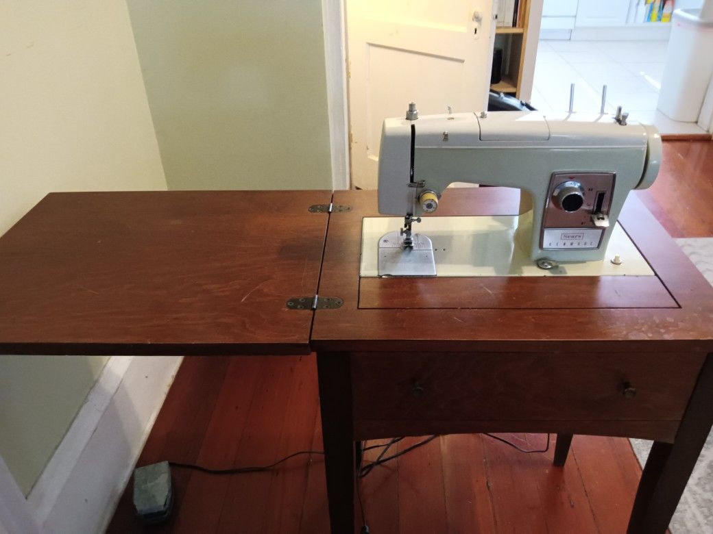 Antique Sewing Machine And Table