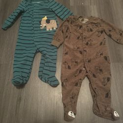 two baby carter’s sleep onesies 6-9 months 
