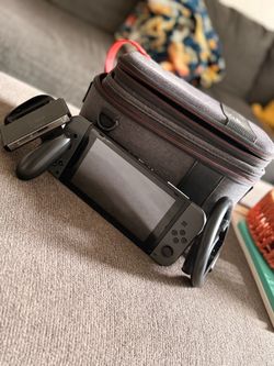 Nintendo Switch with Carrying Case and Accessories