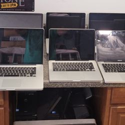 Lot Of 9 MacBook Pro Laptops