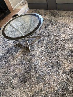 Coffee table and carpet.