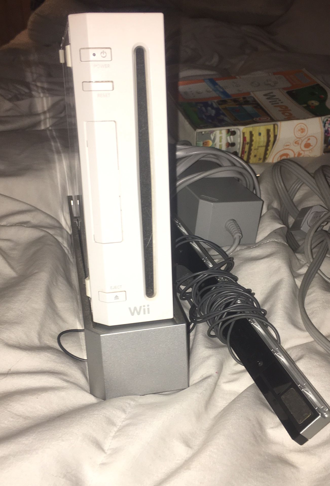 Wii Gaming Console, 3 remotes & 2 silicone cases, joystick, 1 game, all cords & attachments