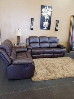 Brown leather reclining sofa and loveseat