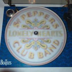 Pro-Ject Essential III Beatles "Sergeant Pepper's" Edition turntable.