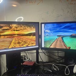 Two Monitors With Stand