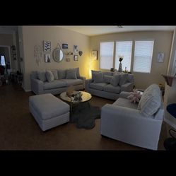 Grey 4 piece Sofa. Looks great & comfy. 