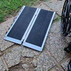 Wheelchair With Folding Ramp
