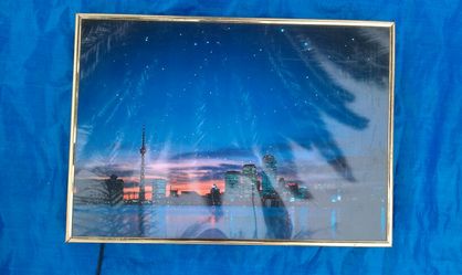 City lights poster frame with extra light bulb