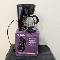 Mr. Coffee 4-Cup Switch Coffee Maker in black. 