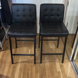 Pair of black bar stools 