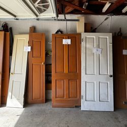 solid doors from late 1950s. Great shape! labeled with sizing 
