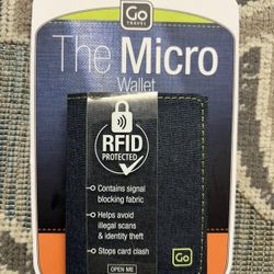 The Micro Wallet RFID PROTECTED -O Contains signal blocking fabric - Helps avoid illegal scans & identity theft -O Stops card clash OPEN ME CONTACTLES