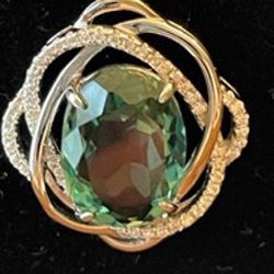 New, Firm, SS Pendant with a 10x13mm Oval Green Amethyst surrounded by 41 CZs in Oval Mounting with SS Bail & 18-in SS Chain