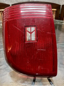 Oldsmobile Rear Tail Light Lens OEM GM Rocket Emblem Vintage Red Lamp