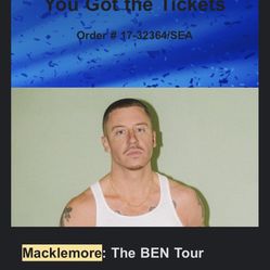 2 floor tickets to Macklemore 