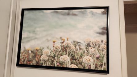 Flowers by the beach canvas photo