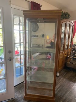 Three shelf light up glass cabinet