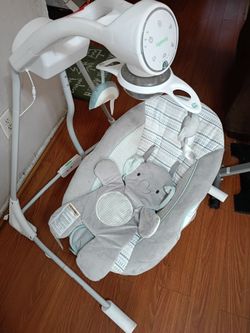 InLighten 5-Speed Baby Swing with a rotating seat