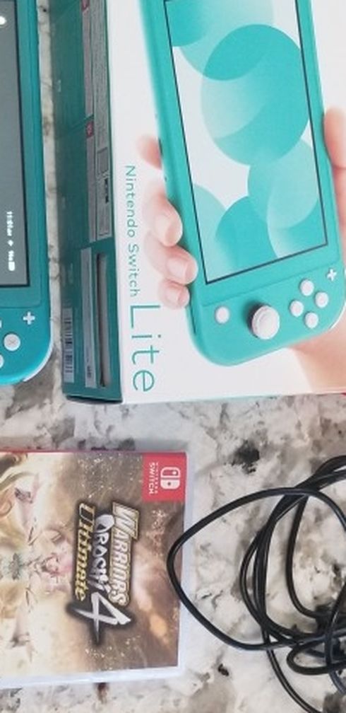 Nintendo Switch Lite W/ Games & Accesories