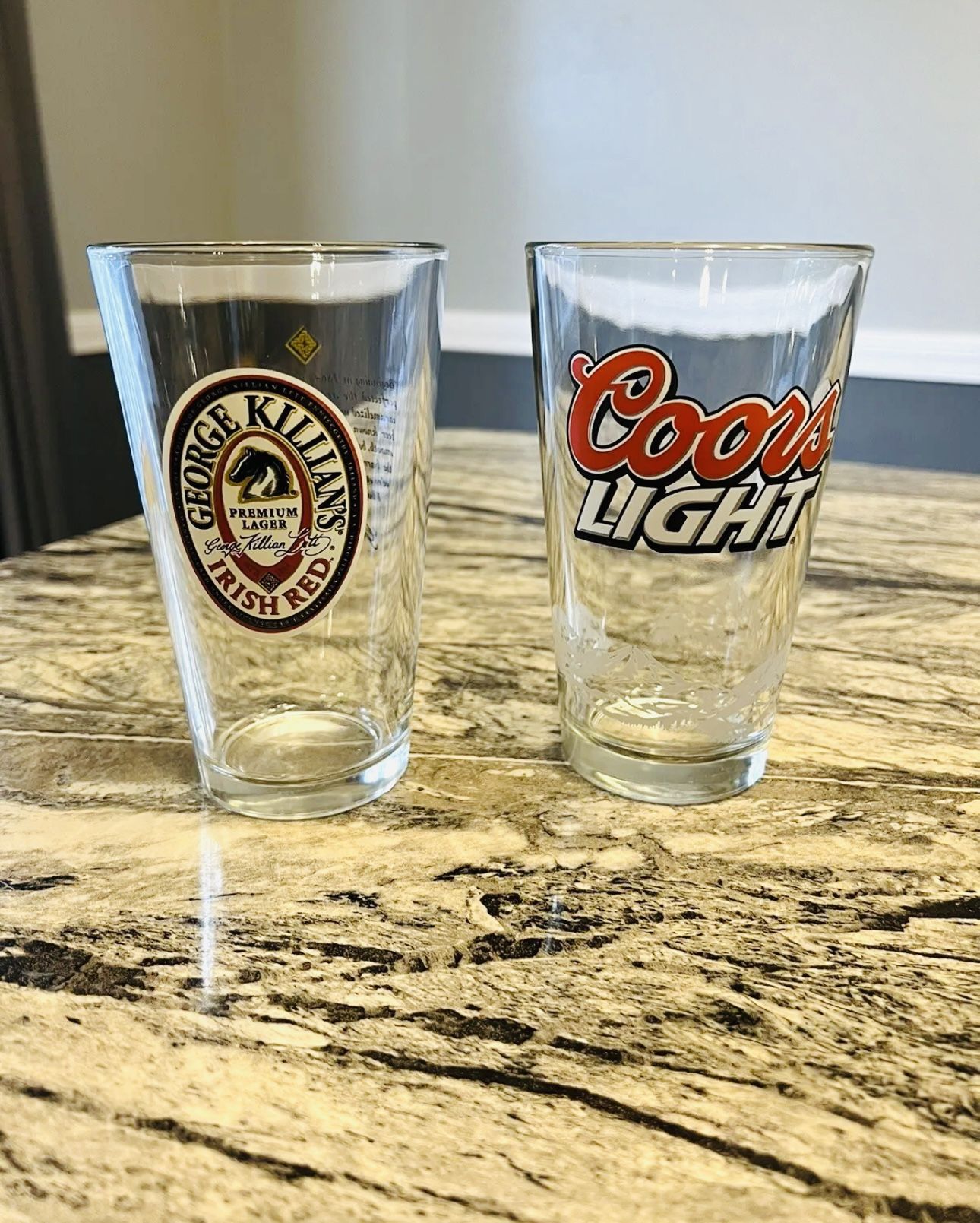 2 Beer Glasses, 1 Killian & 1 Coors.